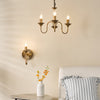 Lydian Wall Light Antique Bronze Bracket Only life style picture with 3 light pendant