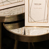 Lyra Nest of 2 Side Tables Champagne accent tables with a gold legs