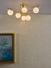 Lysandra 6 Light Semi-Flush Polished Gold and Opal Glass Shades life stye picture