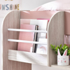 Feminine bunk bed featuring a pretty pastel pink color.