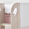 Playful bunk bed for girls' bedrooms in soft pink.