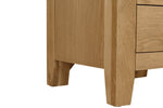 Marsden 3 Drawer Bedside Table Natural Oak close view [picture of the wooden legs