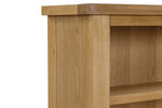 Marsden Low Bookcase Natural Oak close view picture of the slid wooden frame