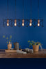 Midi 5 Light Bar Pendant Matt Black and Polished Copper life style picture
