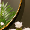 Modena Oval Wall Mirror Gold 60x90 cm close view picture of the mirror curved design