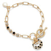 Monochrome Circle Bow Gold Plated Bracelet close view picture of the bracelet design on the white background