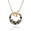 Monochrome Circle Bow Gold Plated Necklace made in a classic design