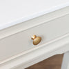 Monroe 1 Drawer Accent Table Stone close view picture of the drawer with a gold handle