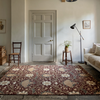 Morris & Co Montreal Floral Rug Russet lifestyle picture in the living room