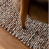 Brink & Campman Nest Plain Rug Leather close-up view picture of the woven pattern