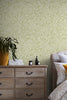 Stylish wallpaper featuring balanced ditsy leaf design in green