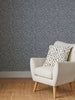 Intricate leaf sprigs on ditsy leaf navy wallpaper