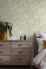 Neutral sage green wallpaper with off white detailing