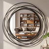 Nicole Swirl Round Mirror Black 90cm lifestyle picture on the wall