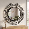 Nicole Swirl Round Mirror Black 60cm lifestyle picture on the wall