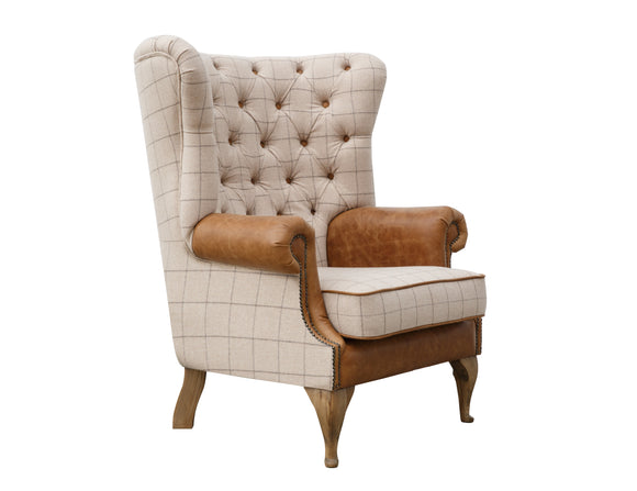 Inviting wrap-around wing armchair.
