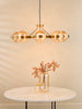 Ophira 8 Light Pendant Antique Gold and Amber Ribbed Glass life style picture