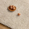 Brink & Campman Origin Low Plain Rug Greige close-view lifestyle picture on the floor