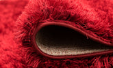 Ottova Shaggy Rug Red close-up view picture of the pile height