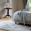 Laura Ashley Parterre Floral Rug Pale Sage lifestyle picture in the bedroom