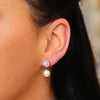 Tipperary Crystal Pave Circle With Drop Pearl Earrings that add you sophistication and elegance.