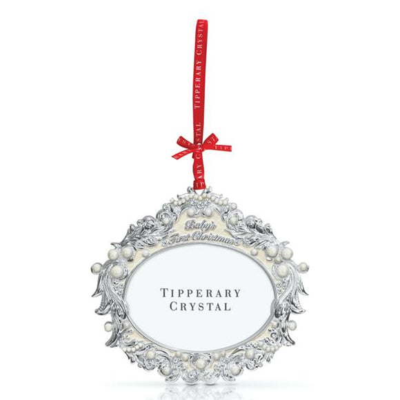 Elevate your holiday decor with the Tipperary Crystal Pearl Christmas Decoration featuring a 1st Frame. Embrace the festive spirit and capture precious memories with this elegant and decorative frame ornament.