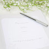 Personalized 'Our Wedding Day' photo album in pastel grey for cherished memories