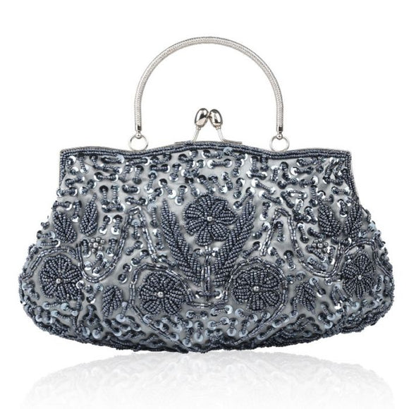 Pewter clutch bag with dazzling rhinestone exterior