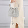 Crystal pouch bag with metallic drawstring closure