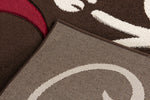 Primrose Floral Rug Choc-Red close view picture of the rug backing