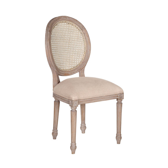 Antique oak dining chair with upholstered rattan back.