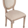 Classic oak dining chair with charming rattan detailing.