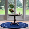Laura Ashley Redbrook Scandinavian Rug Midnight Round lifestyle picture of the rug under dining table