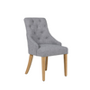 Grey dining chair with contemporary design.