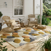 Sanderson Dandalion Clocks Outdoor Floral Rug Ochre/Silver lifestyle picture outside