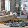 Sanderson Foraging Floral Rug Indigo Round lifestyle picture in the living room