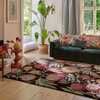 Sanderson Jackfruit Floral Rug Cherry Alabaster lifestyle picture in the living room