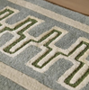 Sanderson Linnean Porcelain Rug 148408 close view picture of the rug border with geometric pattern on it