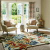 Sanderson Robins Wood Floral Rug Russel Brown lifestyle picture in the living room