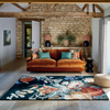 Sanderson Stapleton Park Floral Rug Navy/Burnt Orange lifestyle picture in the living room
