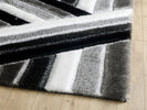 Saturn Geometric Rug - Black Grey picture of the rug corner