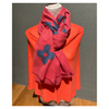 Coral with Blue Flowers scarf adds vibrant style to any outfit.
