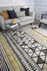 Scion Raita Geometric Rug Taupe lifestyle picture in the living room