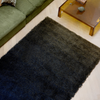 Brink & Campman Shade High Shaggy Rug Brass Indigo life style picture in the living room