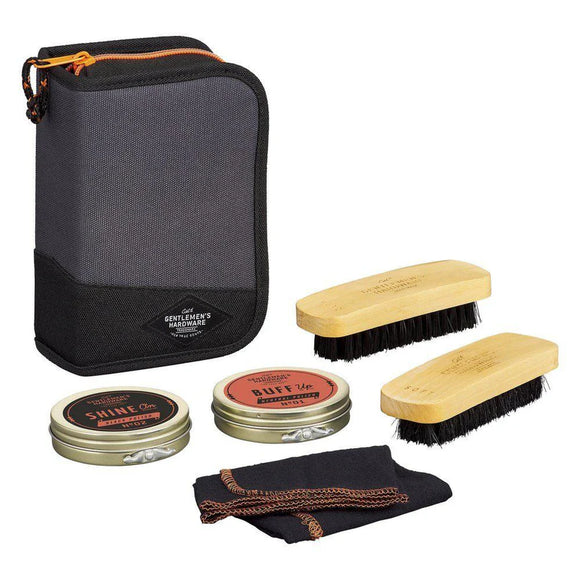 Durable polyester shoe shine kit with polishes and brushes.