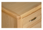 Stylish bedroom drawers with chrome handles.
