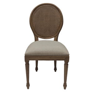 Rustic brown rattan dining chair.