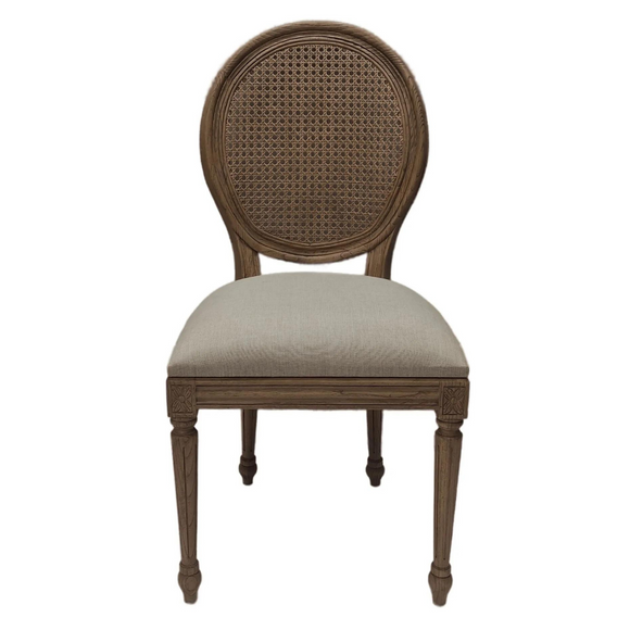 Rustic brown rattan dining chair.