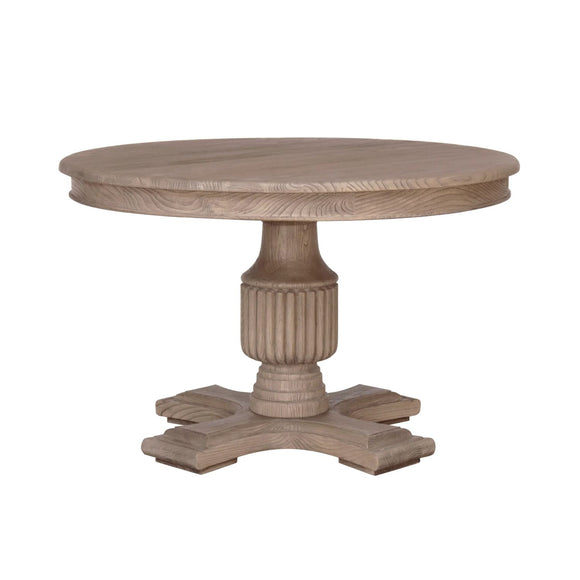 Elevate your dining space with a chic, round table in warm brown tones