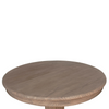 Classic charm: Round table in warm earthy tones.